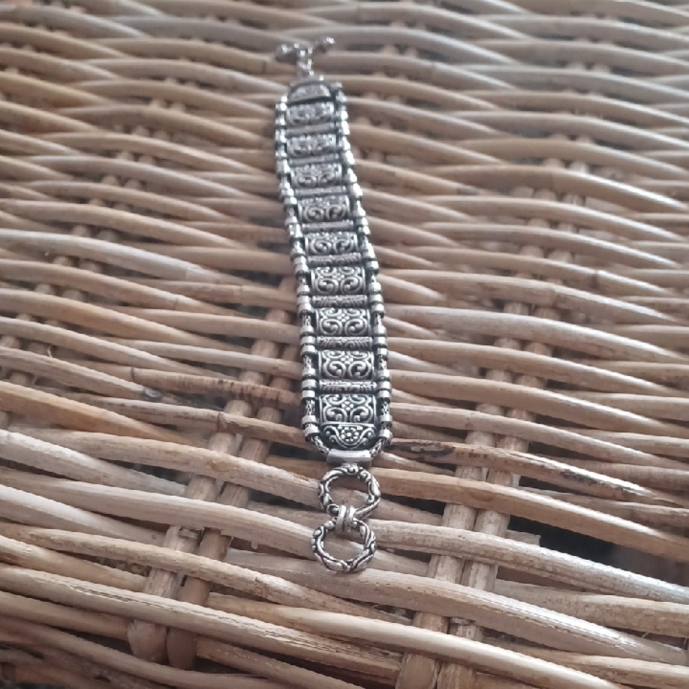 Intricate Silver Bracelet with Floral Design